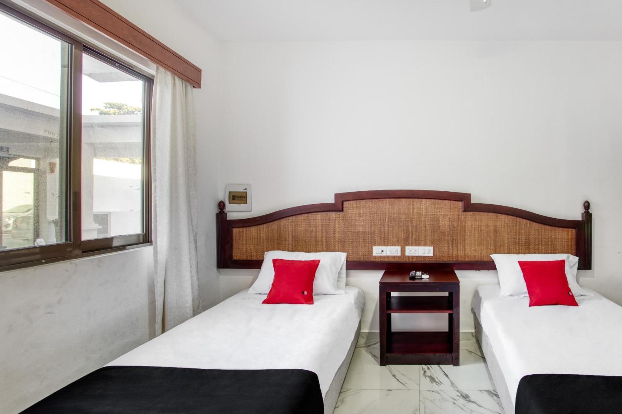 Capital O Hotel Yukon Плая дел Кармен Екстериор снимка