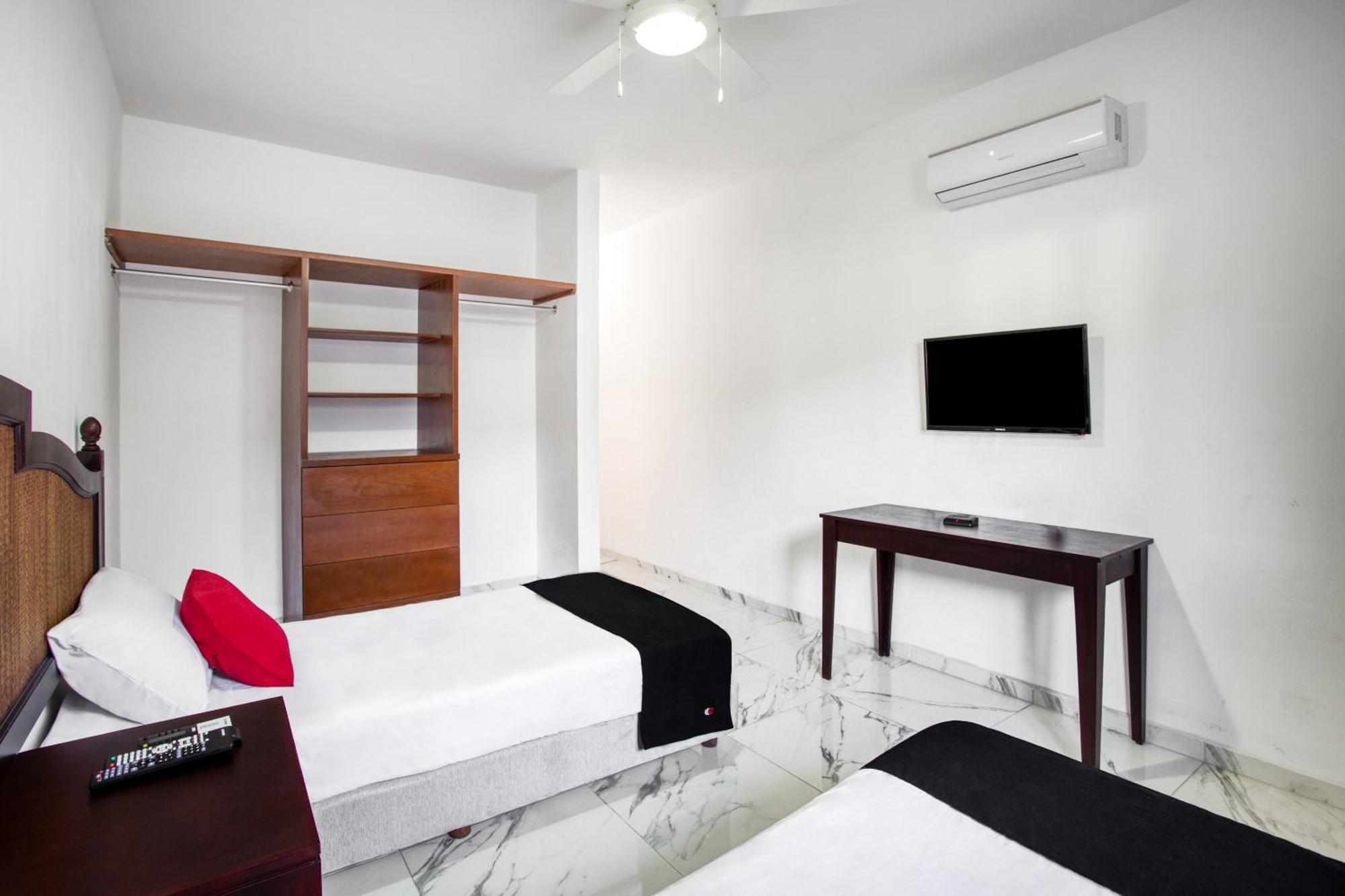 Capital O Hotel Yukon Плая дел Кармен Екстериор снимка