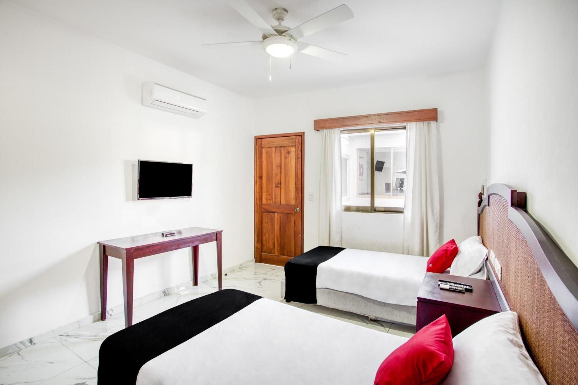 Capital O Hotel Yukon Плая дел Кармен Екстериор снимка